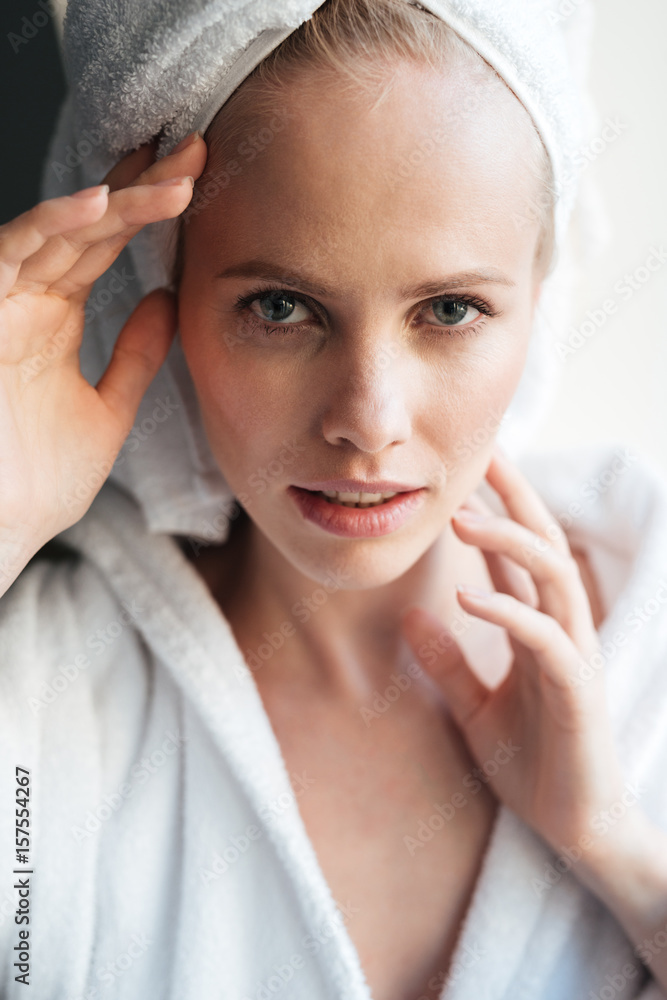 Portrait of beautiful blonde woman looking camera Portrait of beautiful blonde woman looking camera