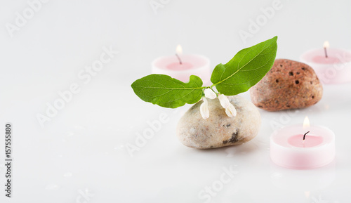 Stones, candles and flowers