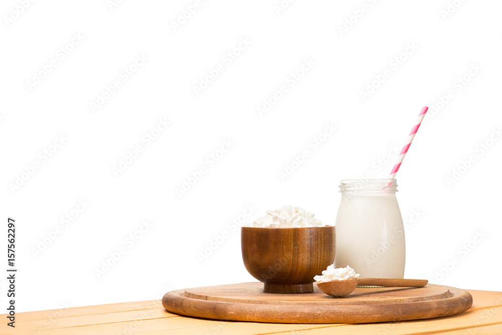 Dairy products on an orange table with isolated background Dairy products on an orange table with isolated background