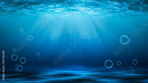 Sunbeams and Sea deep or ocean underwater as a background.