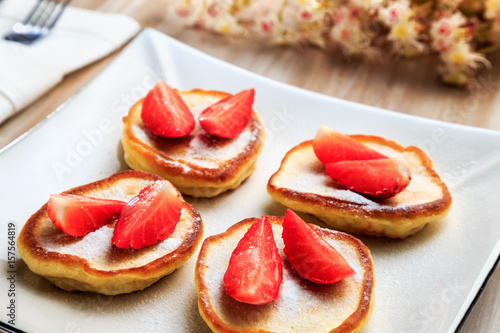 pancakes with strawberry on a plate