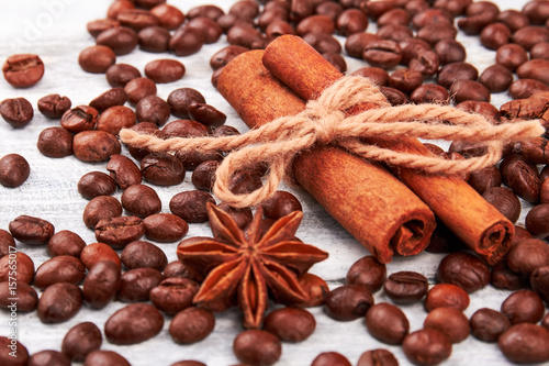Cinnamon and coffee grain. Coffee beans close up. Real coffee for real gourmet.