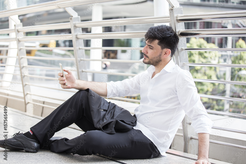 Businessman sitting feeling bad at outdoor place, woman disappoint concept. Businessman sitting feeling bad at outdoor place, woman disappoint concept.