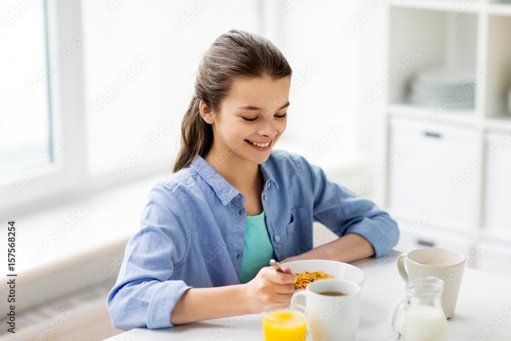 happy girl having breakfast at home kitchen happy girl having breakfast at home kitchen