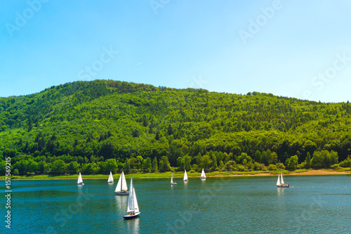 Sailing yachts against the backdrop of the mountains