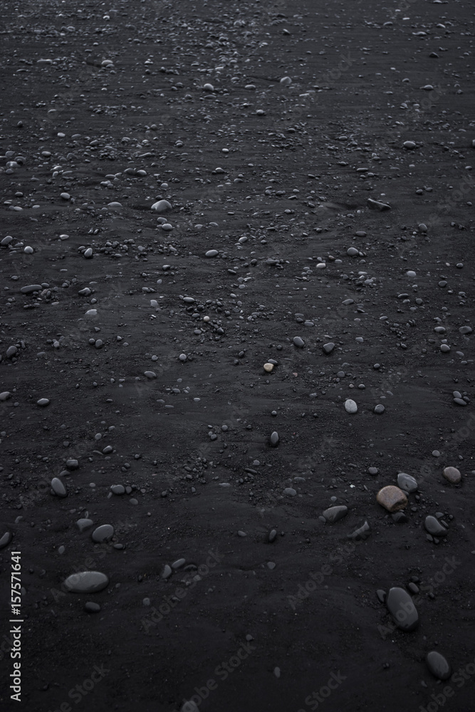 Beautiful black sand beach in Iceland, top view, texture