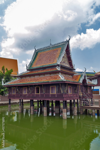 Ho Trai - Traditional Thai-style building used as a library that houses Buddhist scriptures  Tripitaka or Pali Canon  located at Wat Mahathat Temple in downtown Yasothon  Thailand