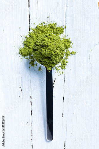 matcha green tea on spoon