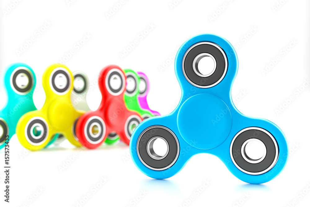Set of colorful fidget spinners with different colors Very popular toy for  distress relief. 3d render illustration. foto de Stock | Adobe Stock