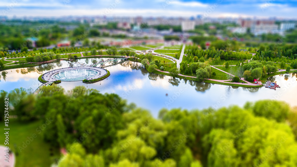 Aerial view of Tsritsyno lake with a fountain - Moscow city in Russia. Tilt-shift effect applied.