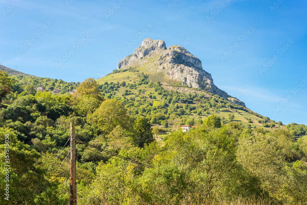 Summit of the Pica de Penamellera in the foothills of the National Park Los Picos de Europa seen from the national road that cross Cantabria to Asturia in the north of the mountain chain