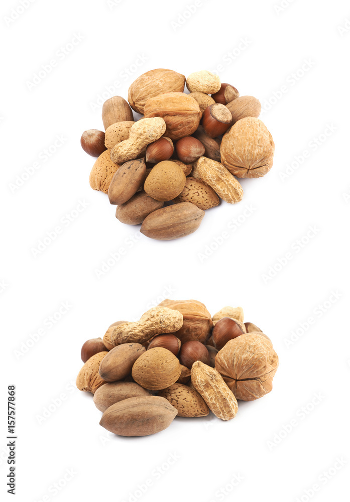 Pile of multiple kind of nuts isolated Pile of multiple kind of nuts isolated