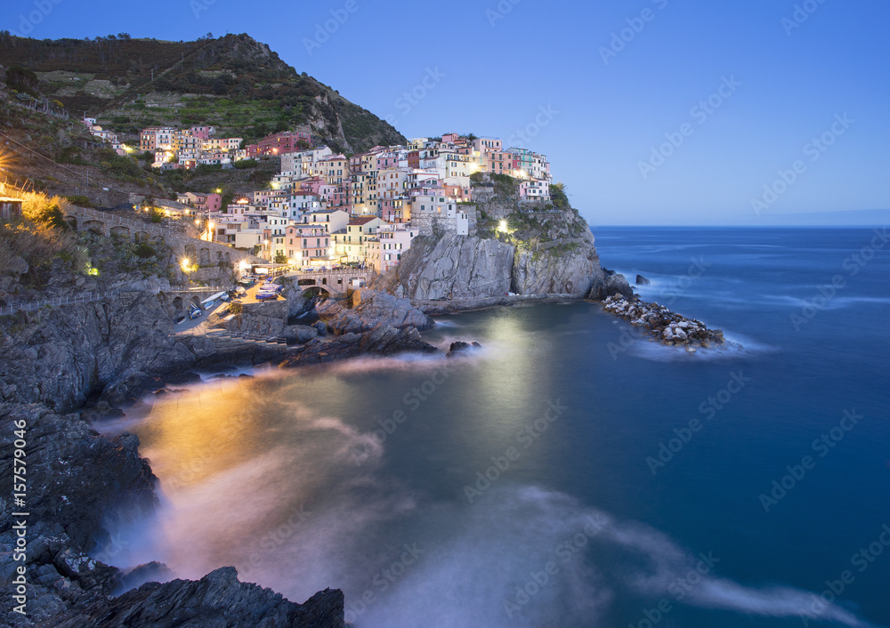 night city in lights on the sea in Italy