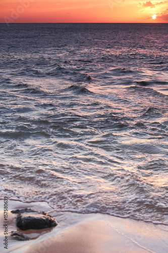 Sunrise/Sunset over ocean waves and rocks