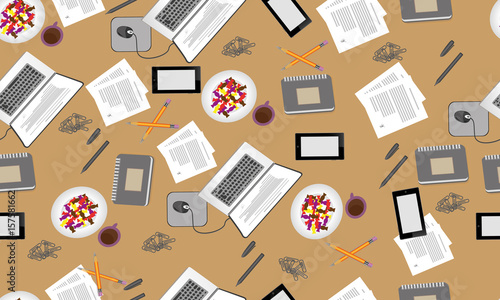 Pattern of a laptop and a trifle. The Notepad is on the table, and documents. The gray notebook is on the table, near two pencil. The spiral-bound pad for notes. Candy with coffee.