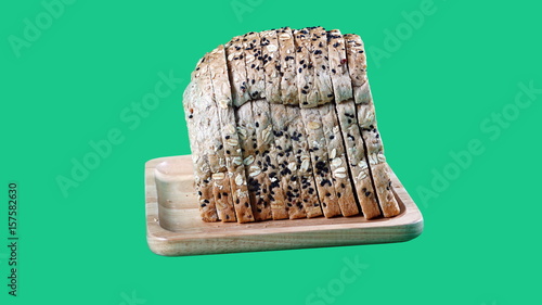 Whole wheat bread with multigrain isolated, cut ready to make banners and advertising. High fibers and good healthy. photo