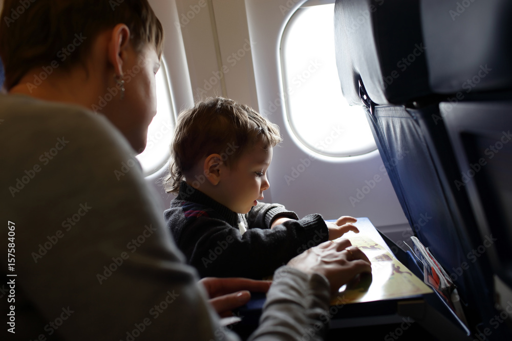 Mother with son in aircraft