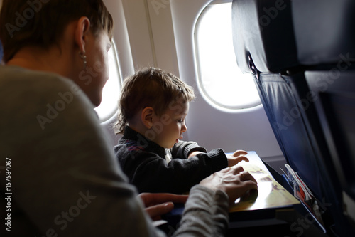 Mother with son in aircraft