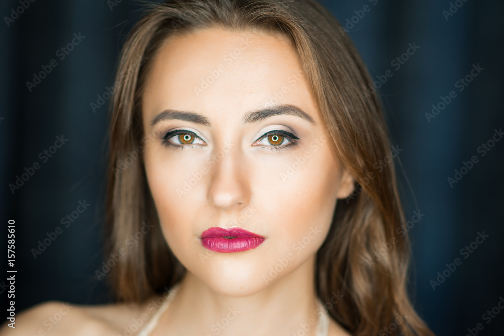 Fashion photo of beauty woman on dark background Fashion photo of beauty woman on dark background