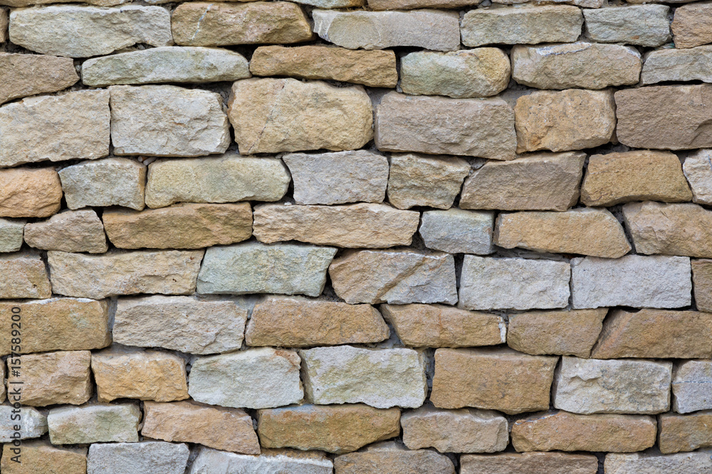 Fototapeta premium Stone wall texture background. Colorful abstract wall texture background for designers