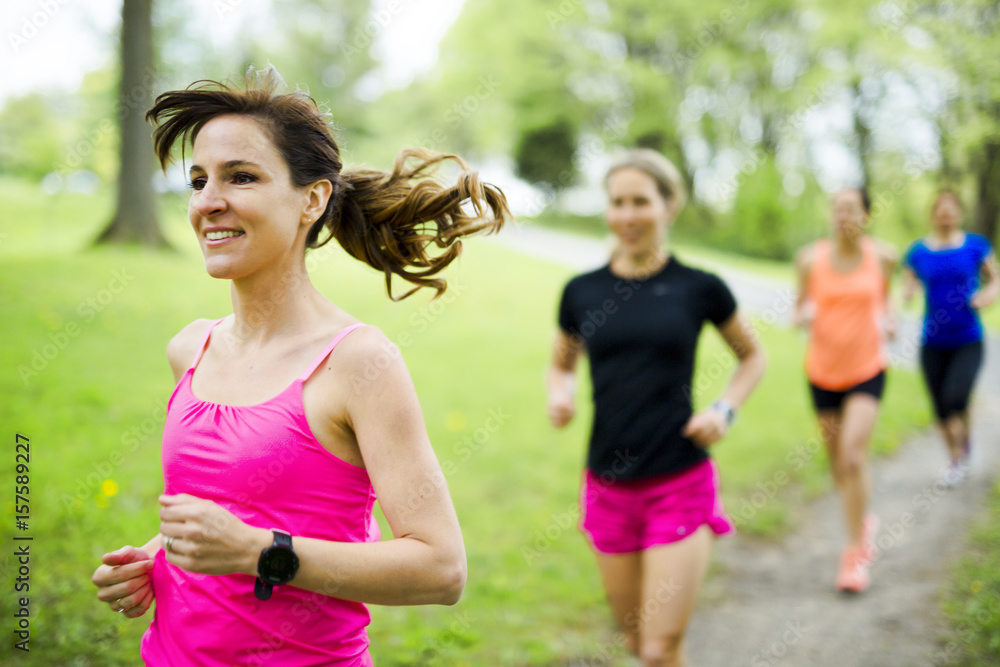 group of people enjoying in the fitness having fun running outside group of people enjoying in the fitness having fun running outside