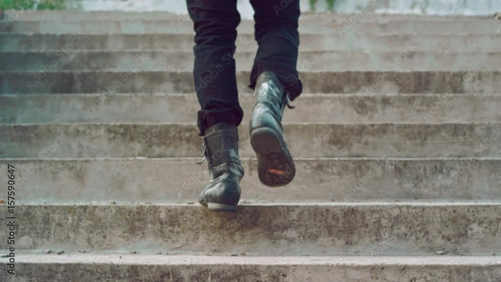 Male legs going up stairs. Man legs walking up stairs. Man in vintage shoes walking up steps. Man climbing stairs. Man legs going upstairs Male legs going up stairs. Man legs walking up stairs. Man in vintage shoes walking up steps. Man climbing stairs. Man legs going upstairs