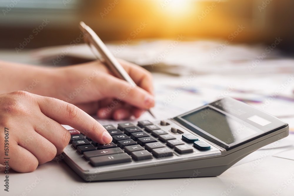 Woman with calculator. Woman with calculator.