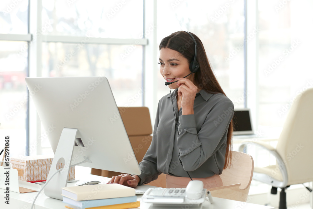 Pretty technical support dispatcher working in office Pretty technical support dispatcher working in office