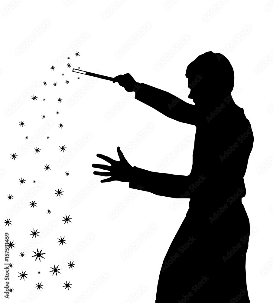 Obraz premium Silhouette of teenage boy wizard creating magic