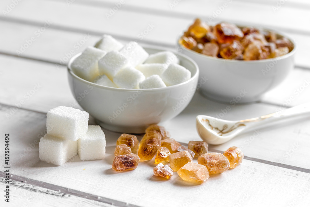 sugar cubes on white wooden table background close up sugar cubes on white wooden table background close up