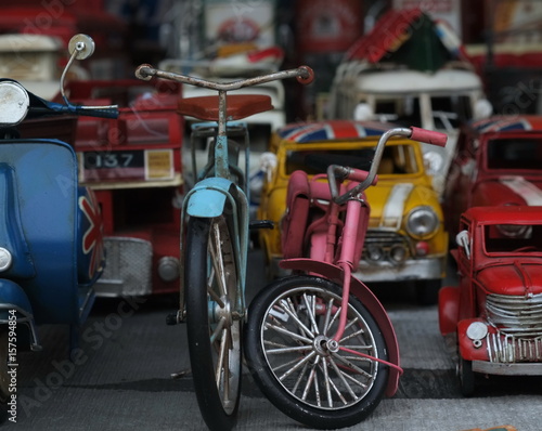 toy cars of various types are made of colorful steel.