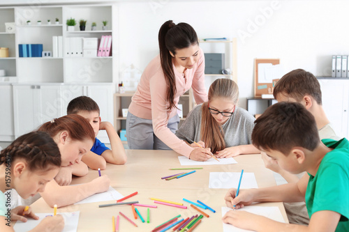 Female teacher conducting l...