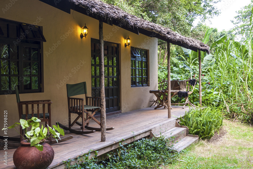 Naklejka premium Hat with thatched straw roof in somewhere Tanzania Africa 