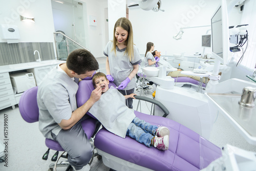 Boy visiting the dentist of for the first time
