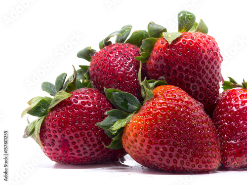 Closeup shot of fresh strawberries. Isolated on white background.