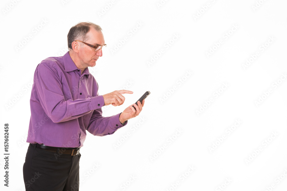 Older man using his cell phone isolated white background Older man using his cell phone isolated white background