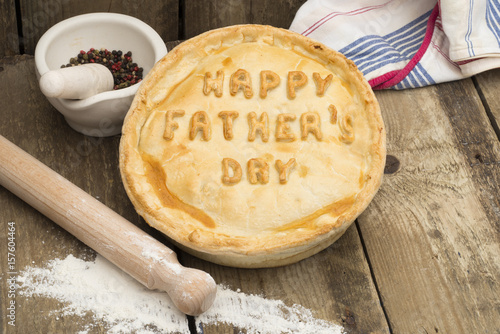 Meat Pie with the Words "Happy Father's Day" on Top