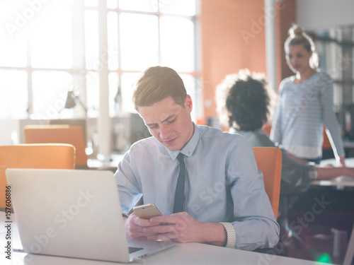 businessman working using a laptop in startup office