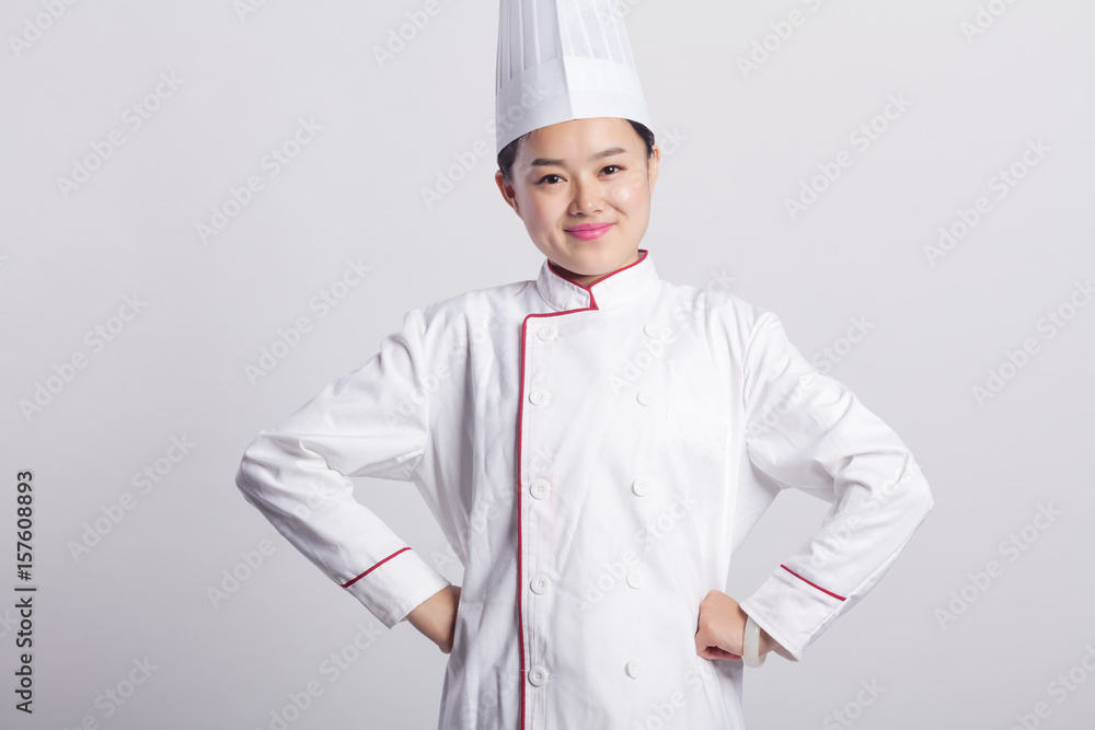 Female chef in front of the background expression Female chef in front of the background expression