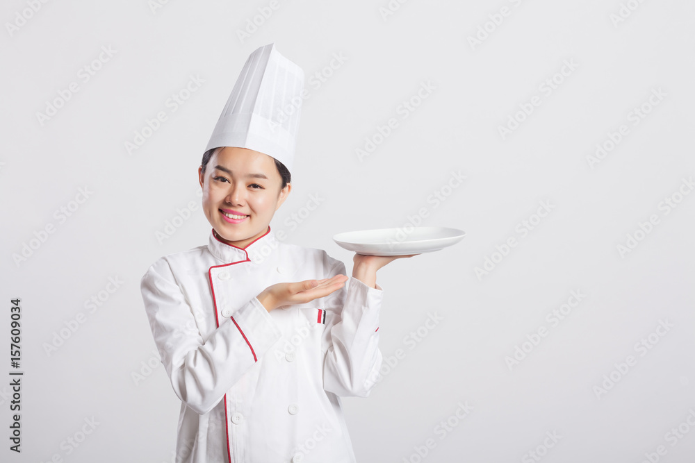 Female chef in front of the background expression Female chef in front of the background expression