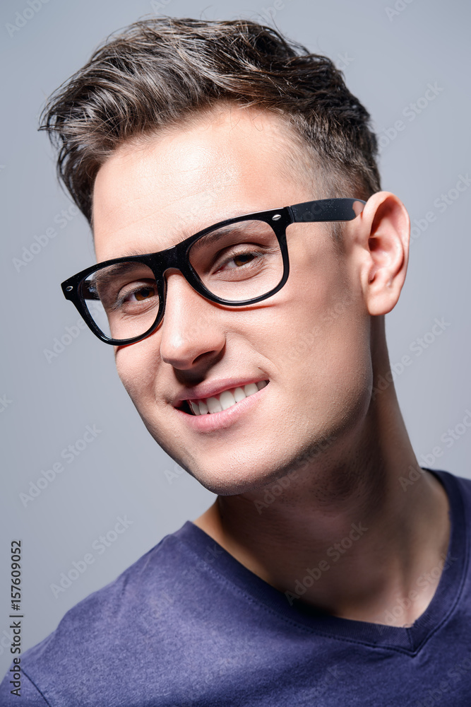 smiling guy in glasses