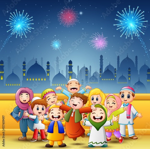 Happy kids celebrate for eid mubarak with mosque and fireworks background