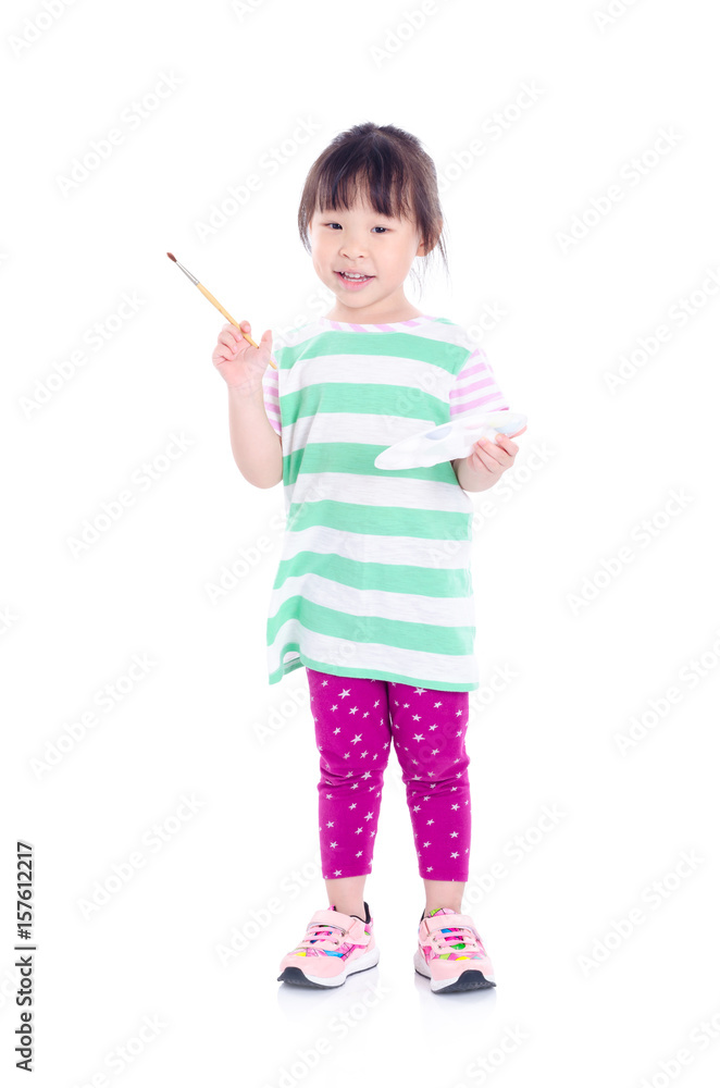 Little asian girl holding paintbrush and palette over white background Little asian girl holding paintbrush and palette over white background