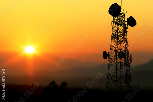 Shadow silhouette,telecommunication towers towers with sunset background blur
