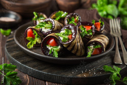 eggplant rolls with garlic feta, tomatoes and herbs