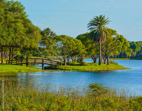 A beautiful day for a walk and the view of the wood bridge to the island at John S. Taylor Park in Largo, Florida.