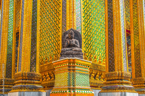 The Stone Buddha statue at Wat Phra Kaew, Royal Grand Palace, Bangkok, Thailand.