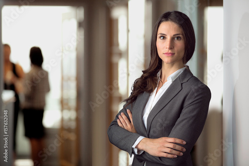 Beautiful attractive lawyer attorney with strong intense serious expression, legal representative