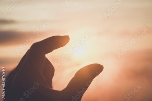 silhouette hand with sunlight