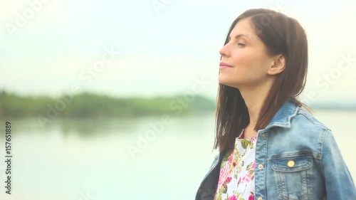 Woman in a river dress photo